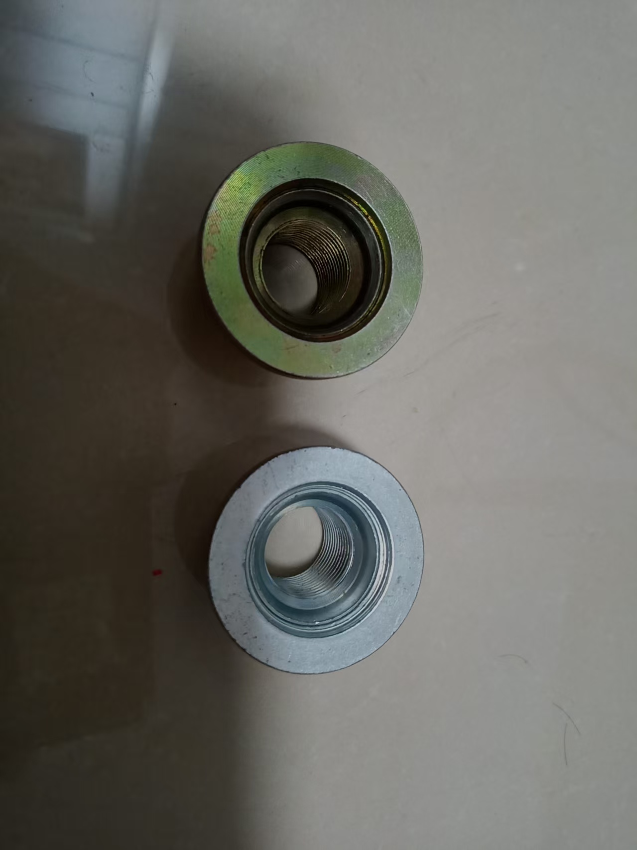 我司找热处理加工厂，月一百吨的螺母件，如图，要求厂家按标准热处理就可